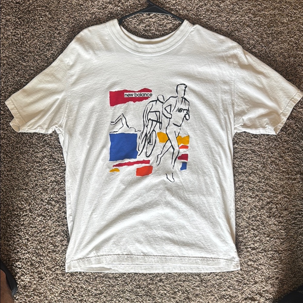 New Balance White Graphic Tee with Multicolor Design